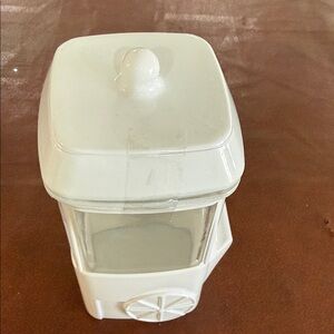 White Decorative Candy Jar with Lid and Wheel Detail